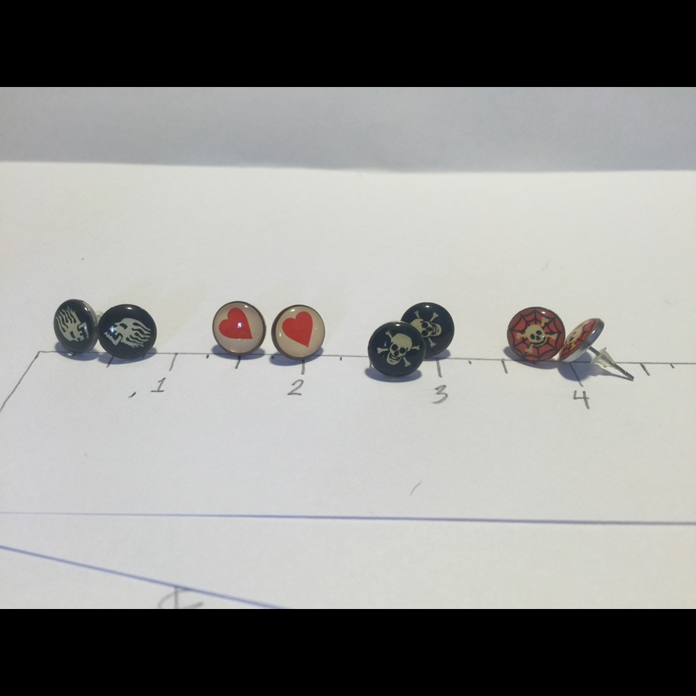 NEW stainless steel studs package of four pairs