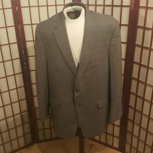 Men's medium grey plaid Jos A. Bank suit. Men's medium grey plaid Jos A. Bank suit.