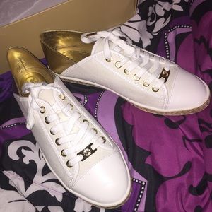 MK lace up slip ons