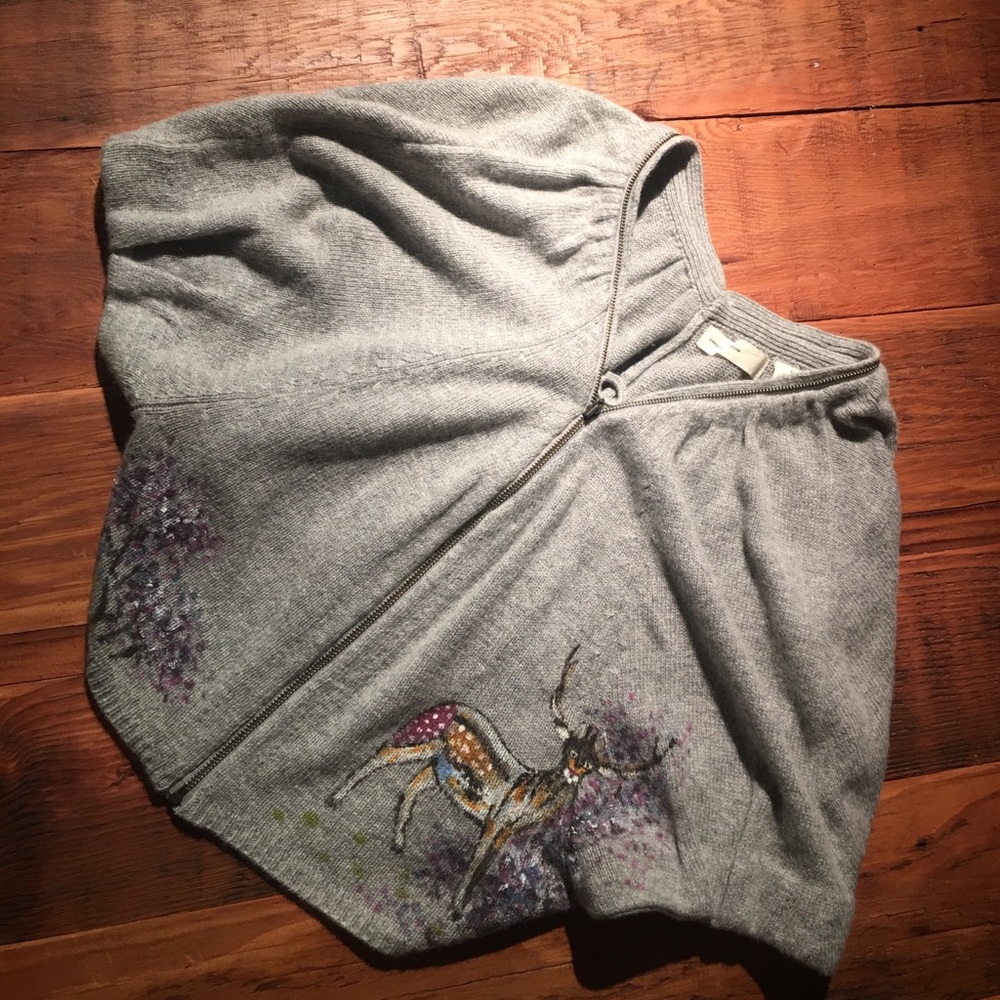 Crop top zip up by sleeping on snow.
