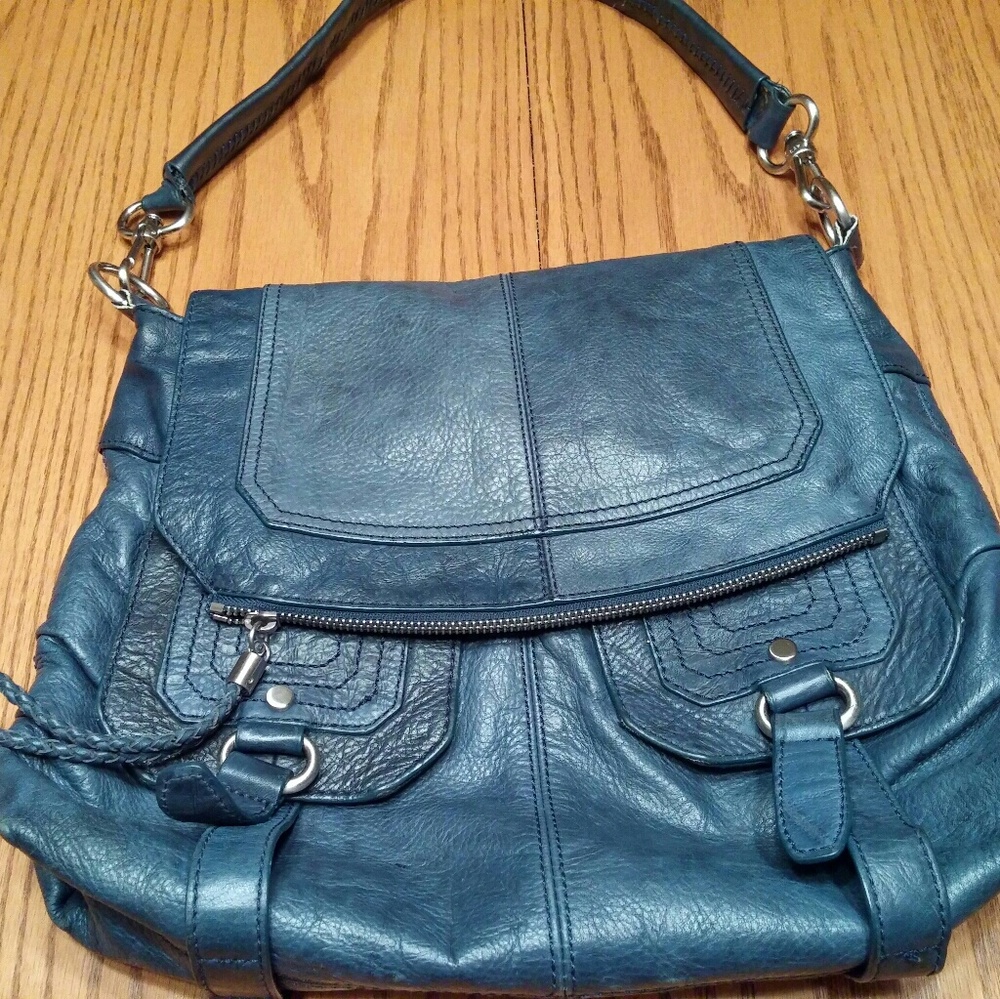 The Sak navy leather handbag.