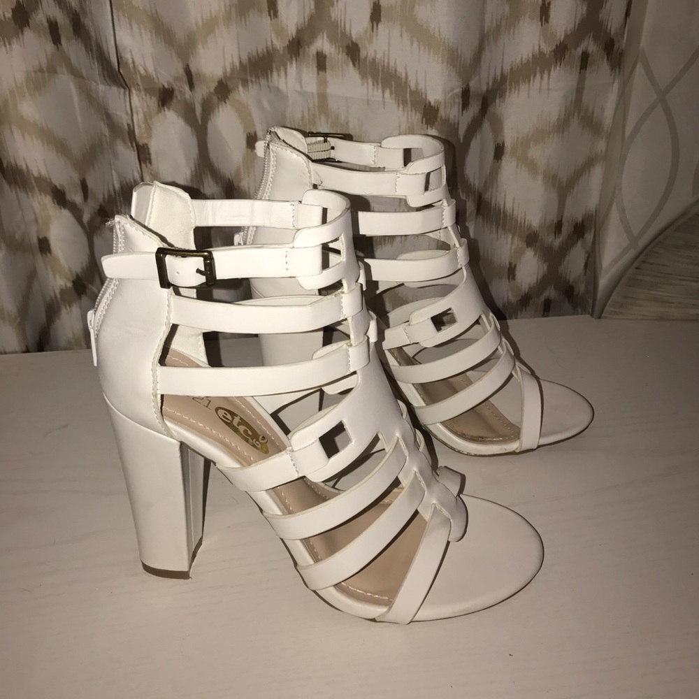 Strapped white heels