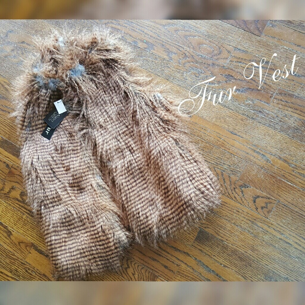 CiSono: by Cavalini faux fur vest.
