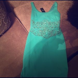 Super cute aqua colored tank dress.