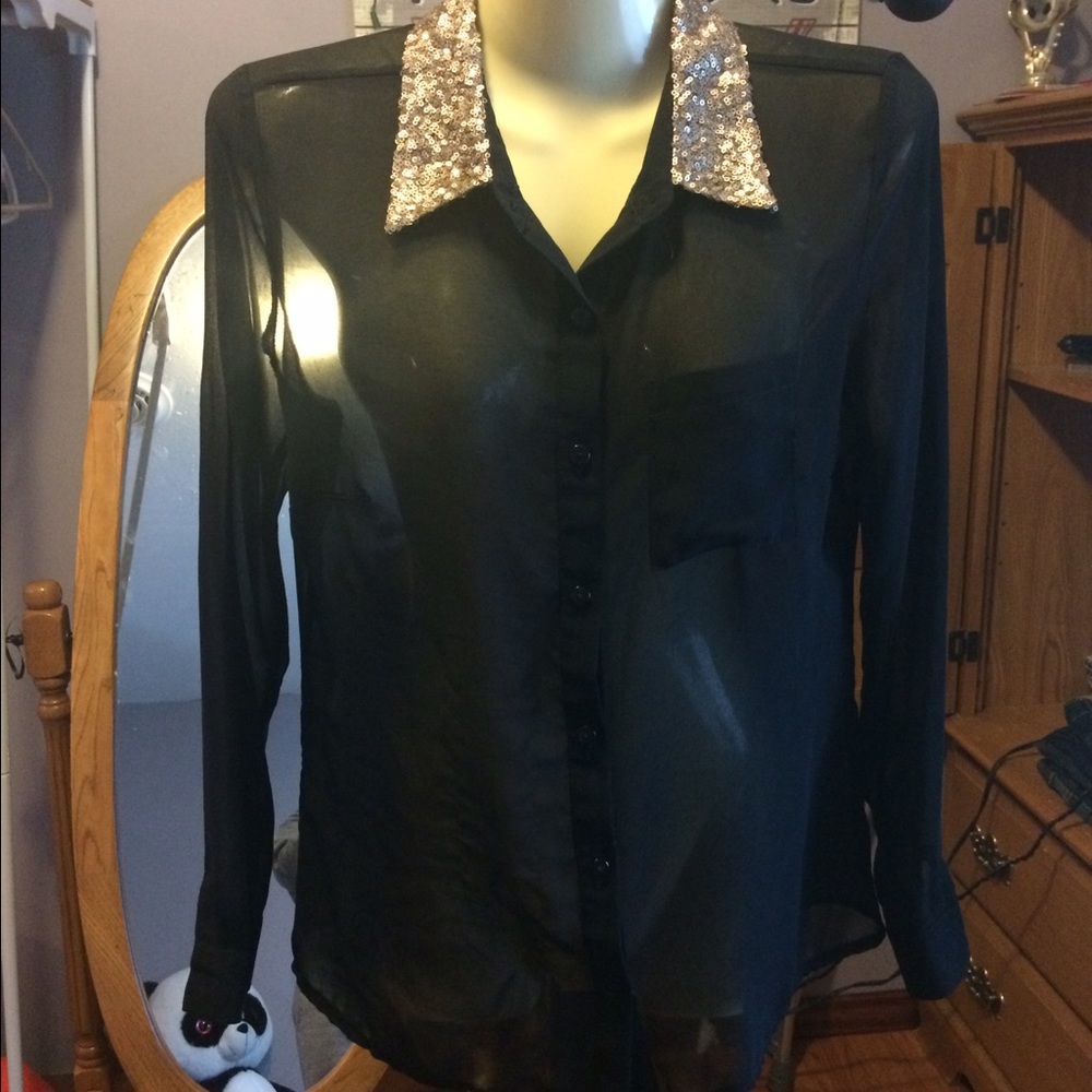Four button down blouses
