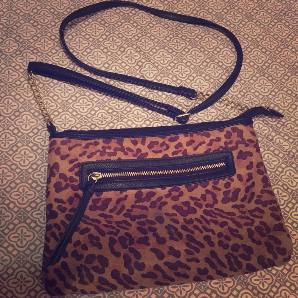 A leopard cross body purse