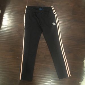 Brand new Adidas Pants with pink stripes