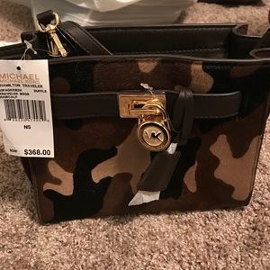Michael Nora cow pattern bag