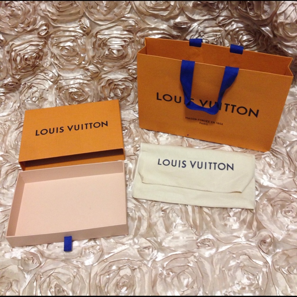 Authentic Louis Vuitton box and dust bag.