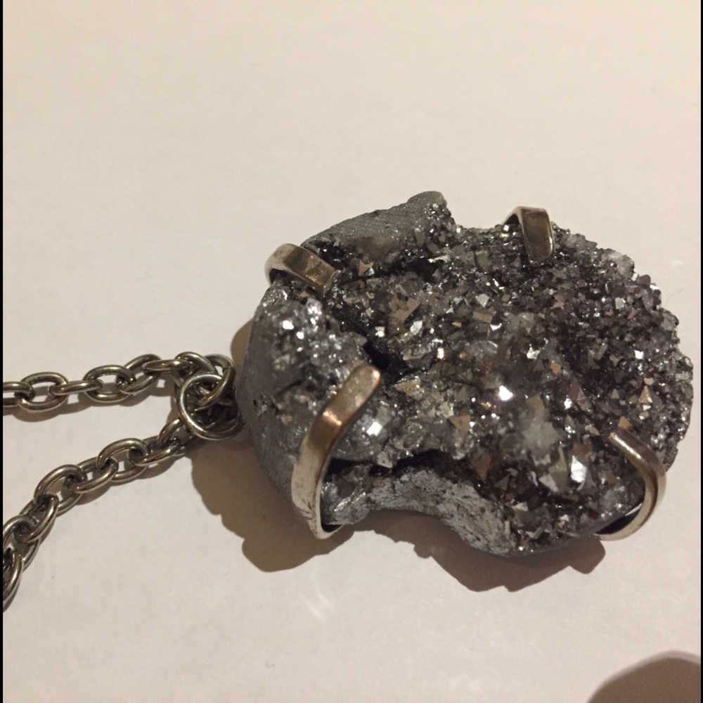 silver necklace with big chunky pyrate stone