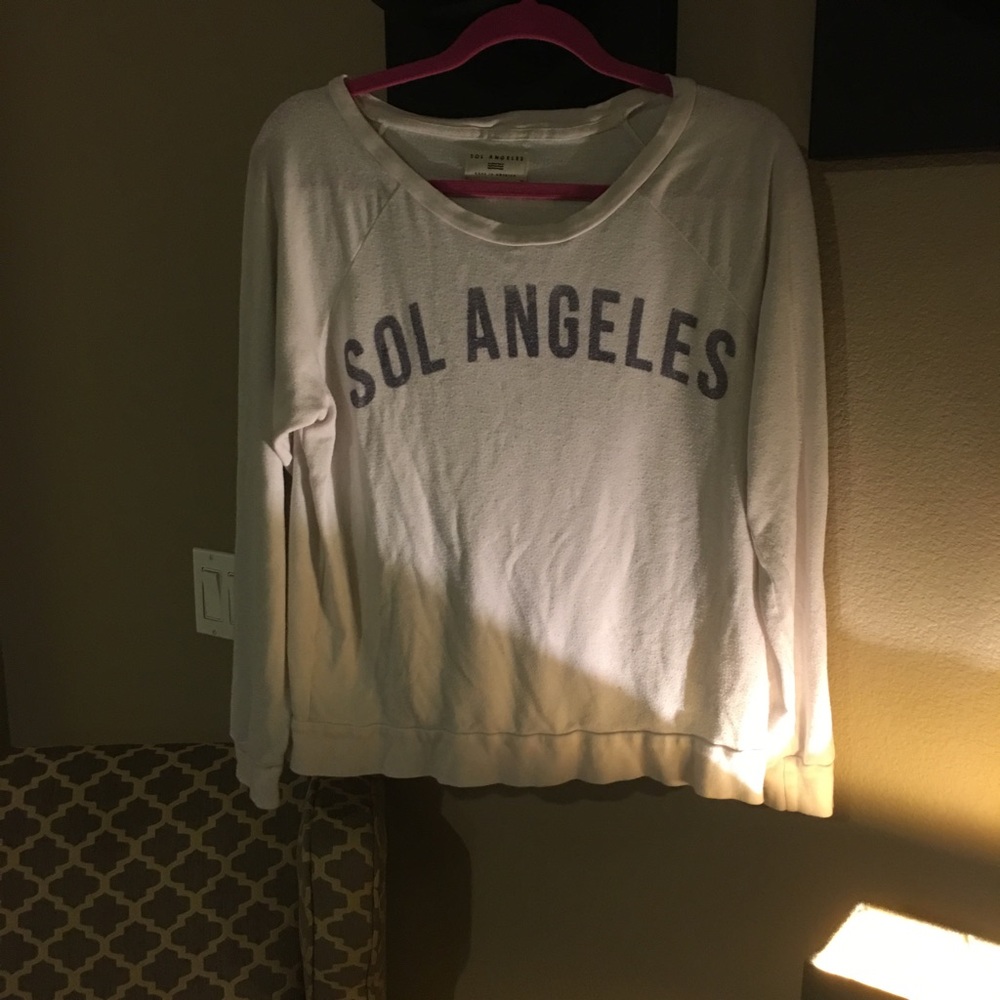 Beach jumper. Sol Angeles. Cream navy text.