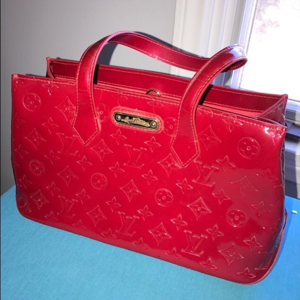 Red Louis Vuitton bag. I'm open to offers ☺️