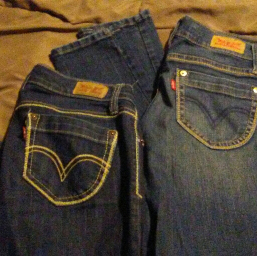 2 pairs of levis 524 too super low denim.