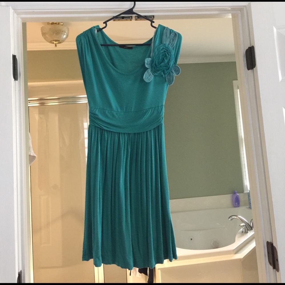 Turquoise dress with flower
