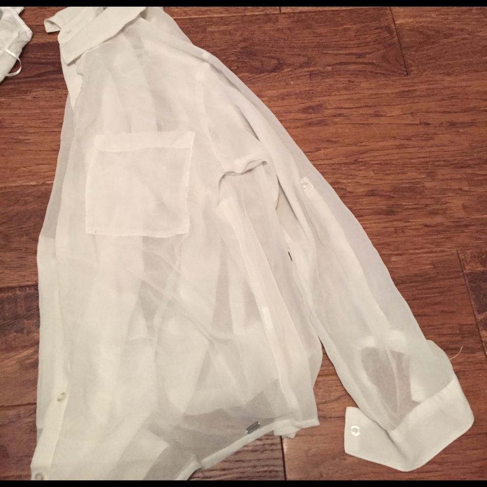 Sheer ivory button up from Garage