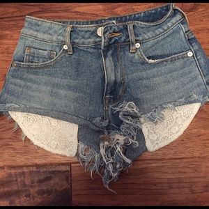 Kendall and Kylie lace pocket distressed shorts