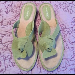 Size 9.5 green sandals.