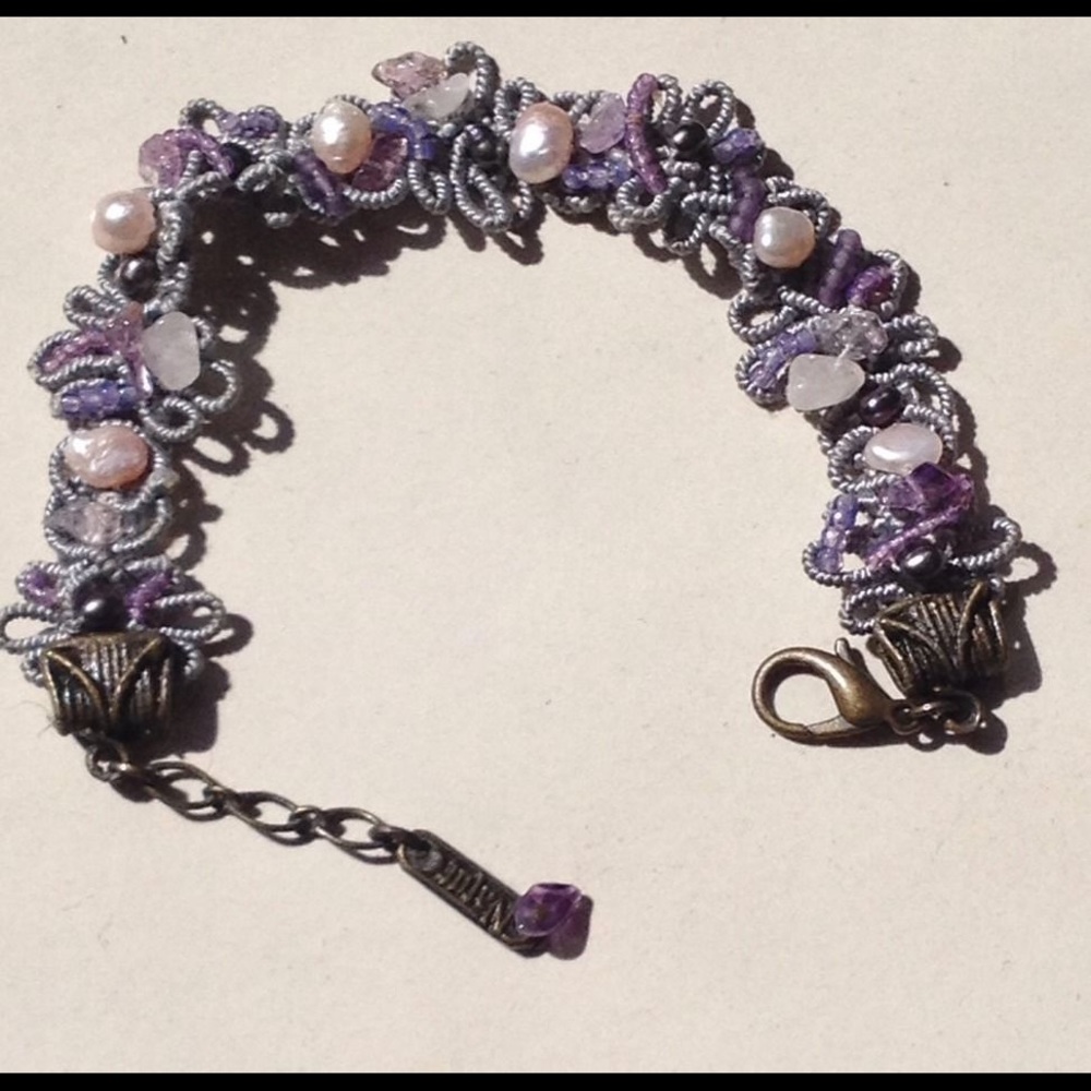Purple natural woven and beaded bracelet