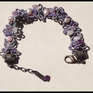 Purple natural woven and beaded bracelet