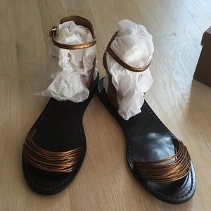 Coach bronze sandals Size 10.  Worn only once!