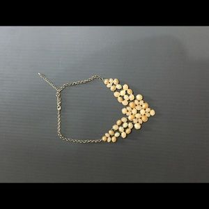 Gold tone jewel bibbed necklace