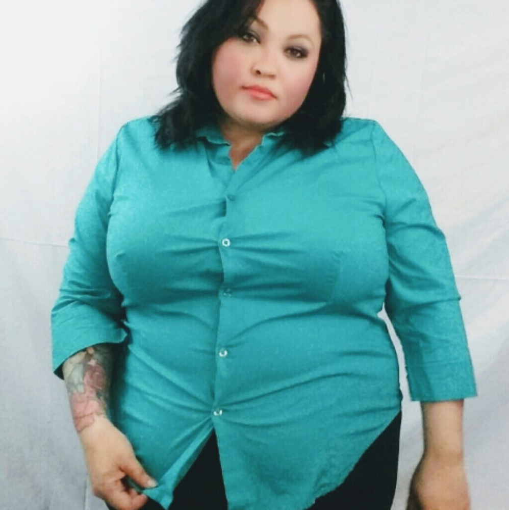 Womans green plus sized button down blouse