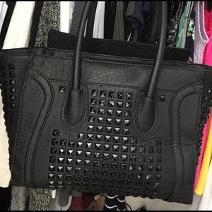 Black studded bucket bag