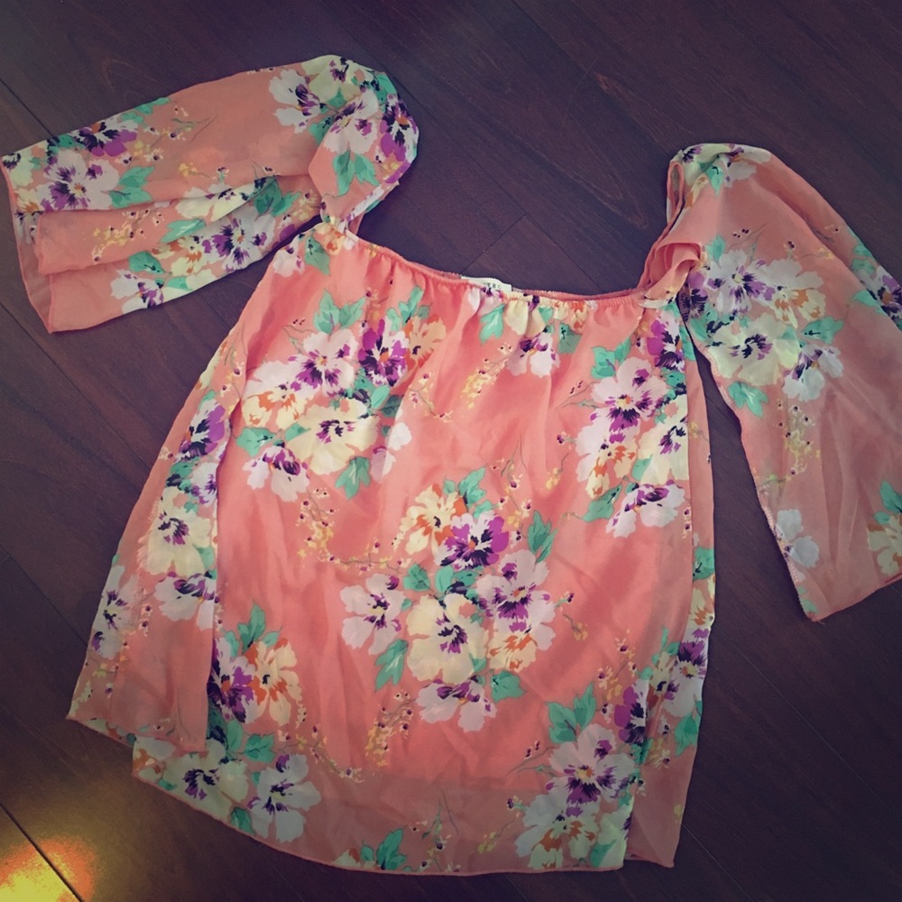 Open shoulder like new satin blouse.