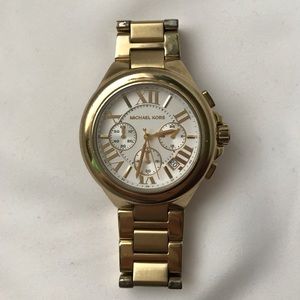MK gold watch