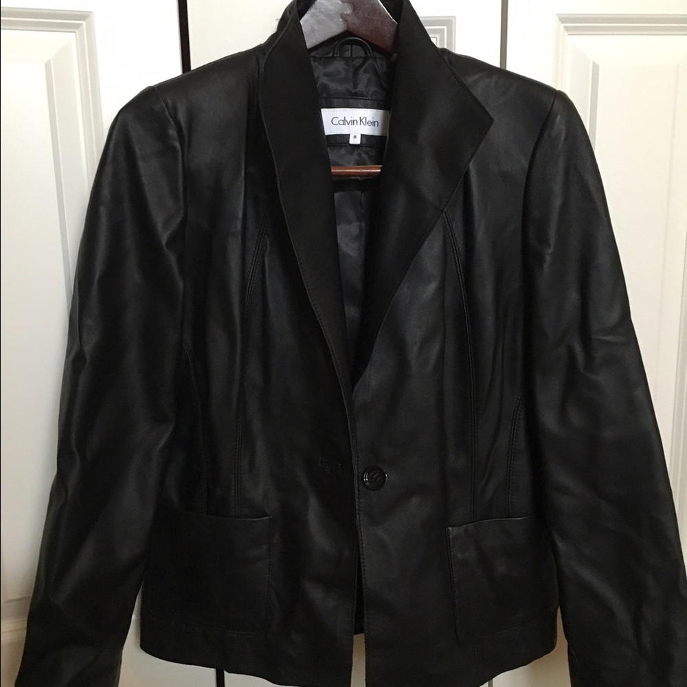 Leather blazer,  jeans to office or evening out.