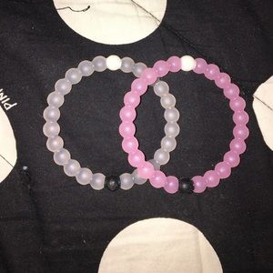 Clear and Pink Lokai bracelets