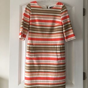 Beautiful peach and tan shift dress. Size 6.