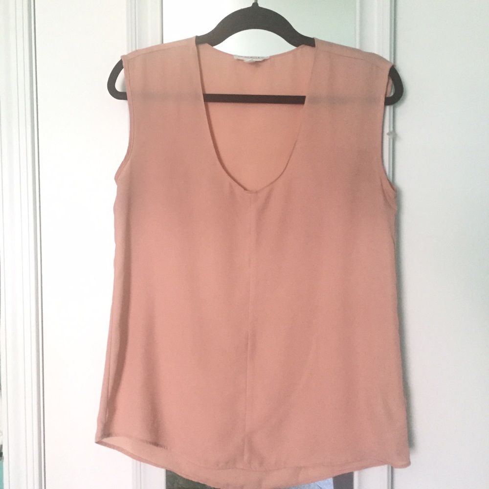 Peach colored blouse