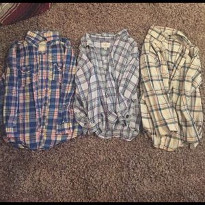 3 flannels. Size small/medium