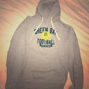 Green Bay Packer sweatshirt with beer pocket