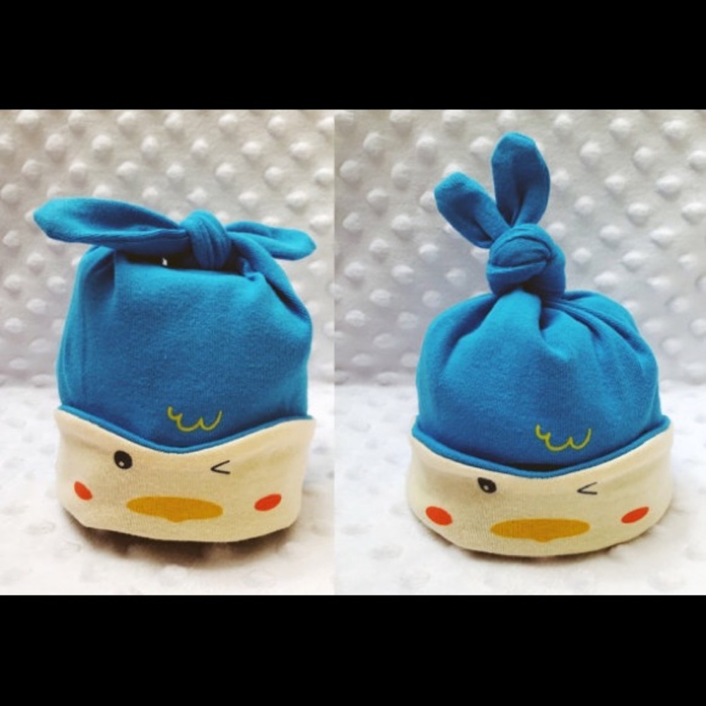 Animal character baby knot beanie.