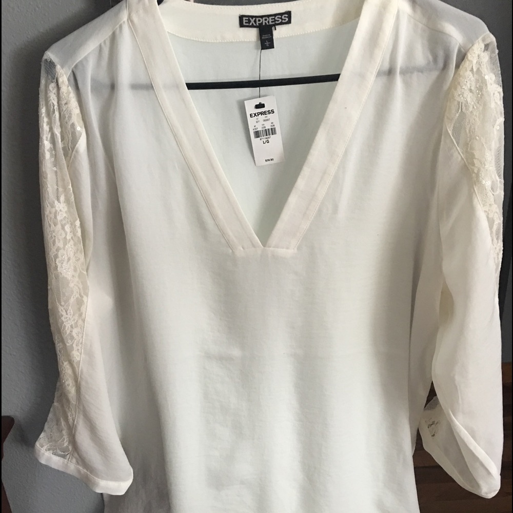 Express creme colored blouse