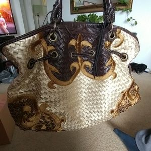 Black, Tan and gold hobo style bag