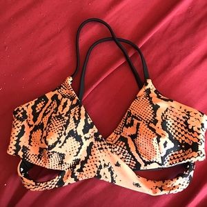 Reversible bikini top with criss cross detail.