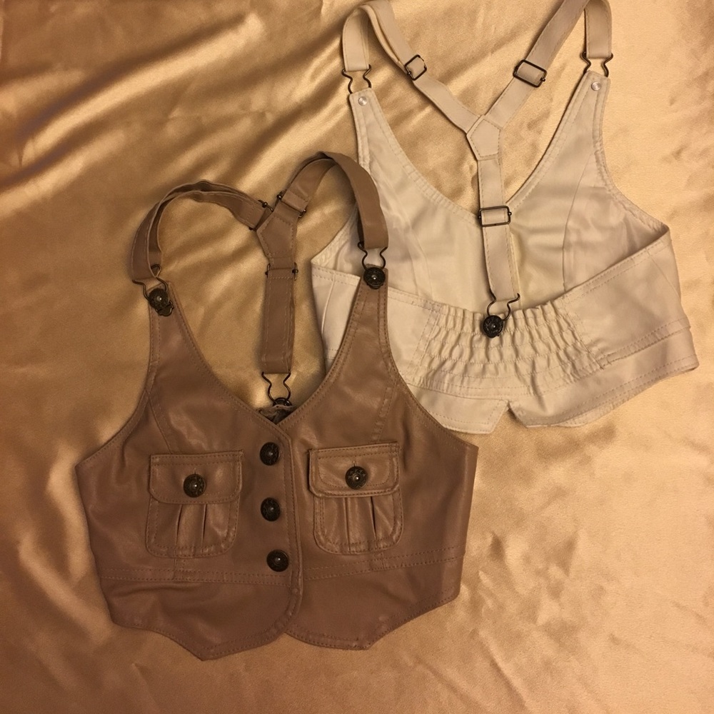 Two identical button up vest