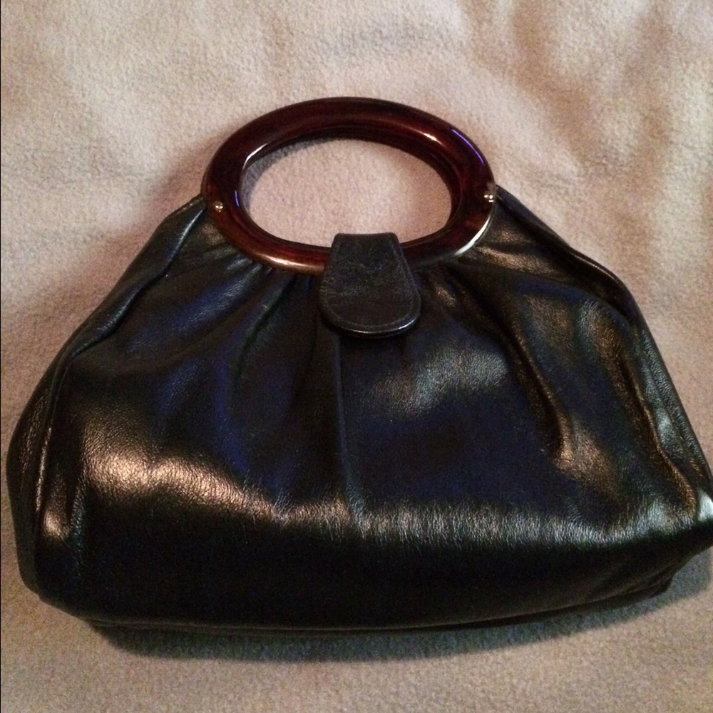 Small black bag with snap closure