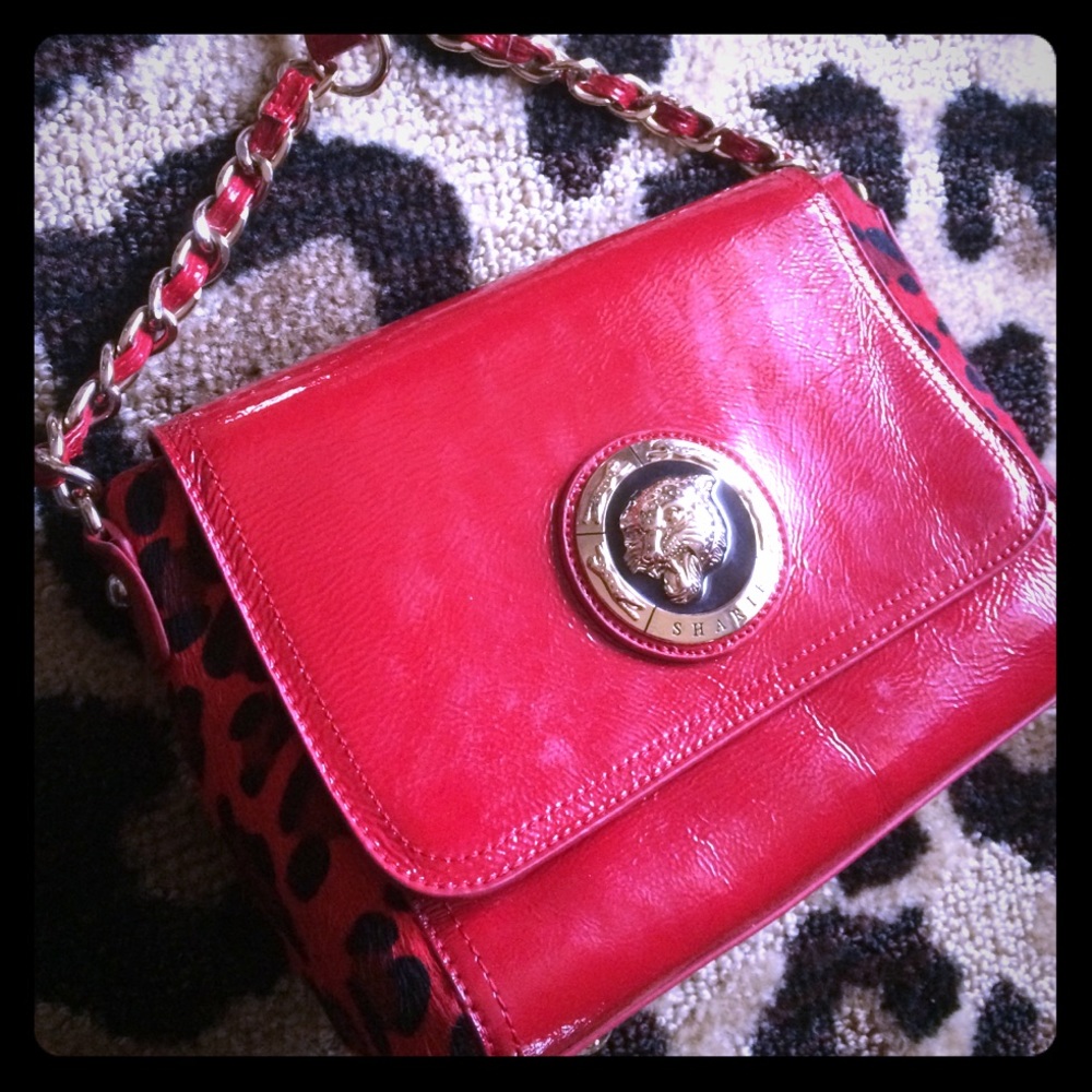 Sharif leather purse red an Black cheetah print