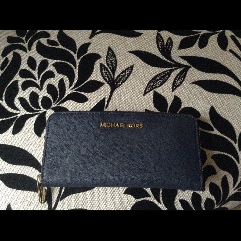 MK blue Continental wristlet