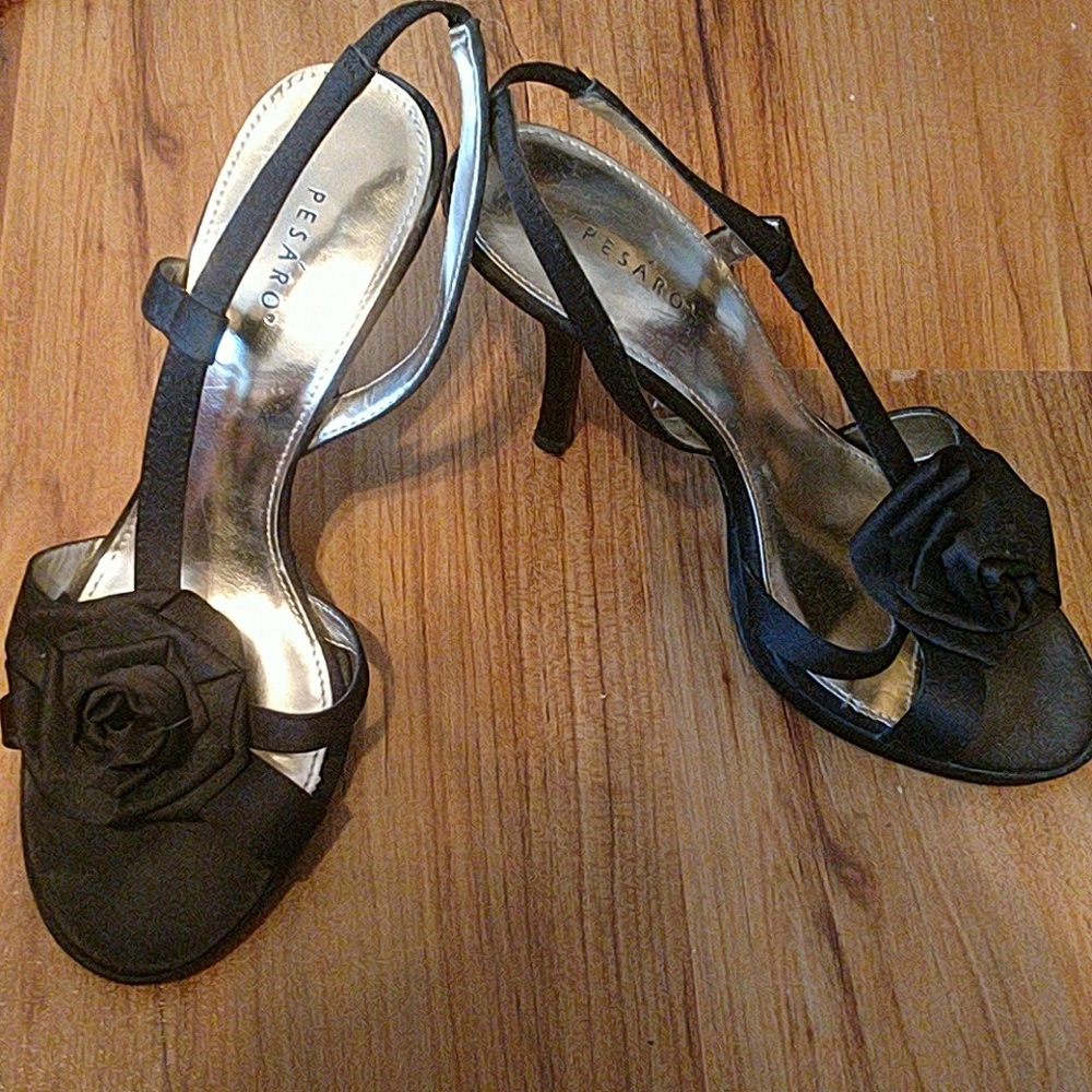 Black heels with rose detail
