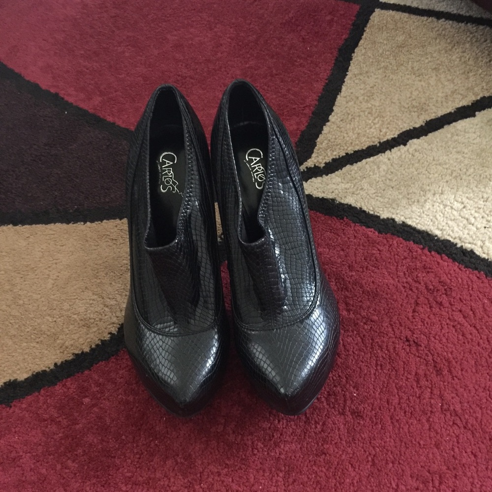 Carlos Santana booties in high sexy heels.