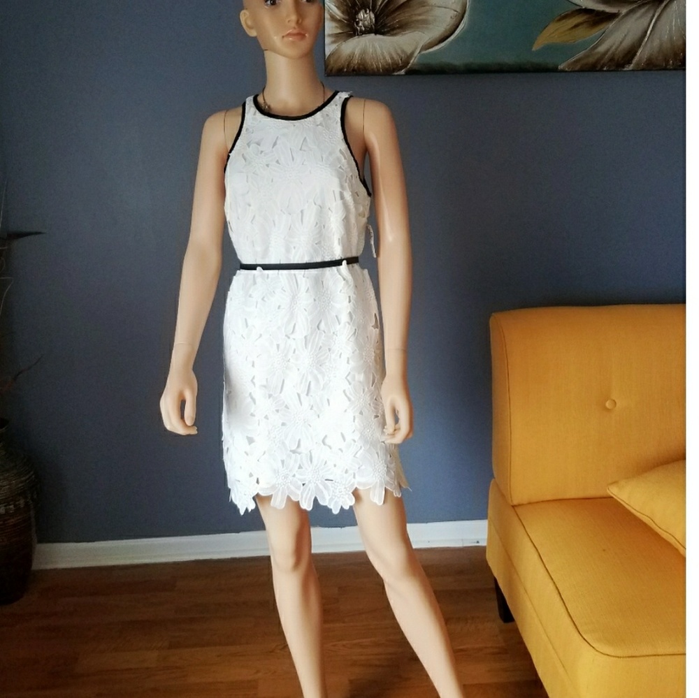 White flowery lace dress with black details