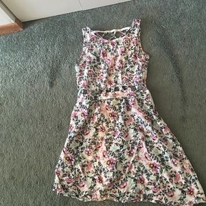 Super cute dress with cut outs on the ribs