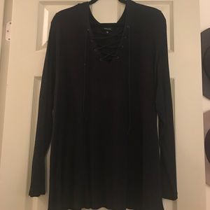 Classy black tie up shirt.