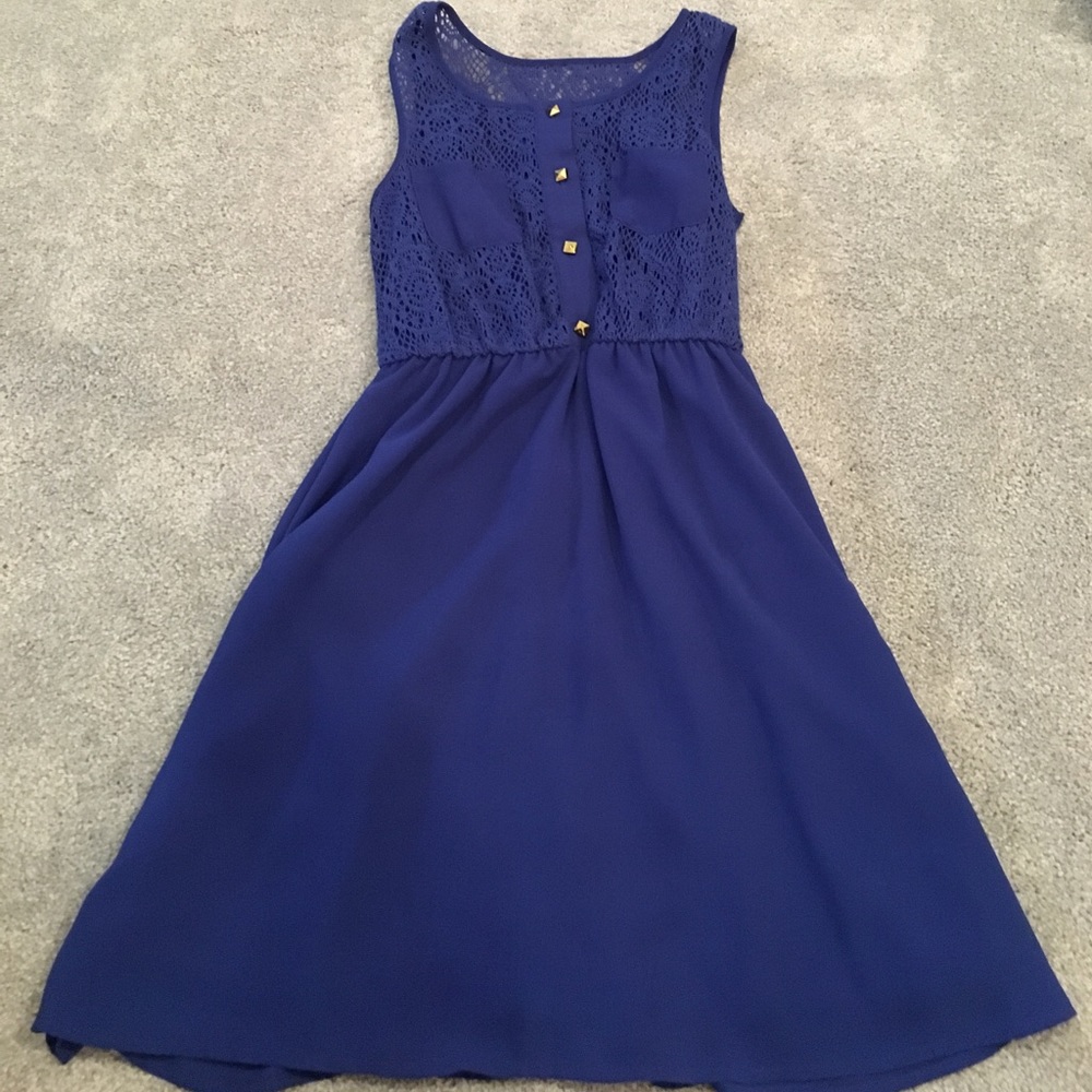 A royal blue dress with blue lace at the top