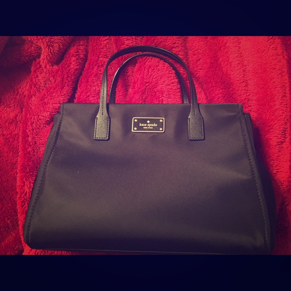 Kate Spade black bag. Leather handles w/strap
